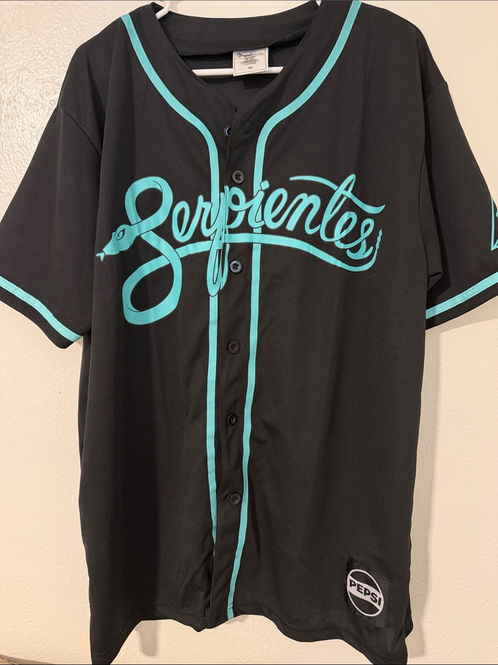 Designers Originals Black Baseball Jersey with Teal Script